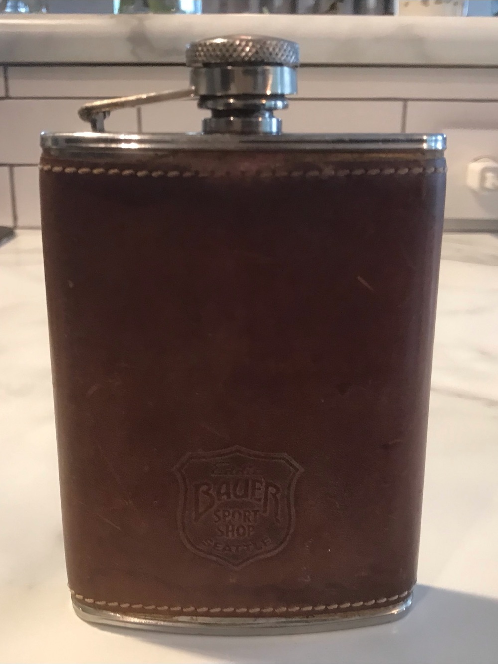 Vintage leather wrapped stainless steel flask